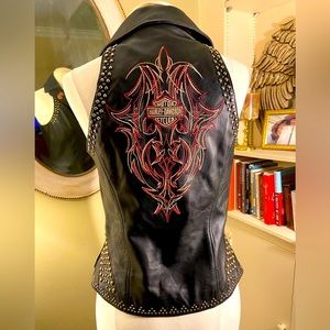 Women’s black leather motorcycle vest by Harley Davidson M Studs and embroidery.